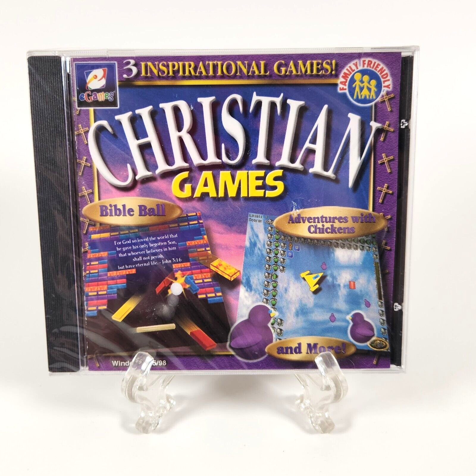 A boxed computer game titled "Christian Games," featuring three inspirational games, "Bible Ball," "Adventures with Chickens," and more. The package indicates it is family-friendly and is displayed on a clear plastic stand.
