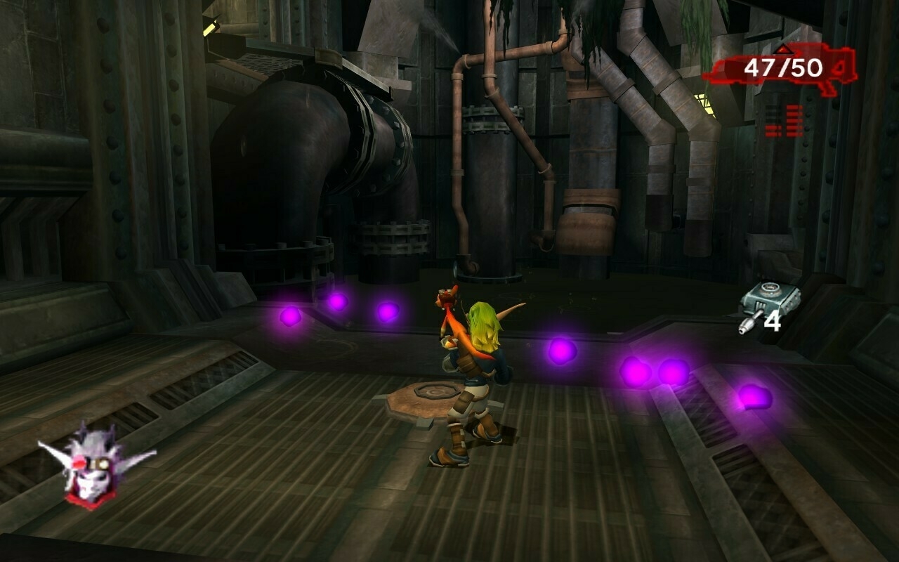 A screenshot from the video game Jak 2. Jak is standing in a dark room with a large pipe in the background. There are several purple crystals on the floor.