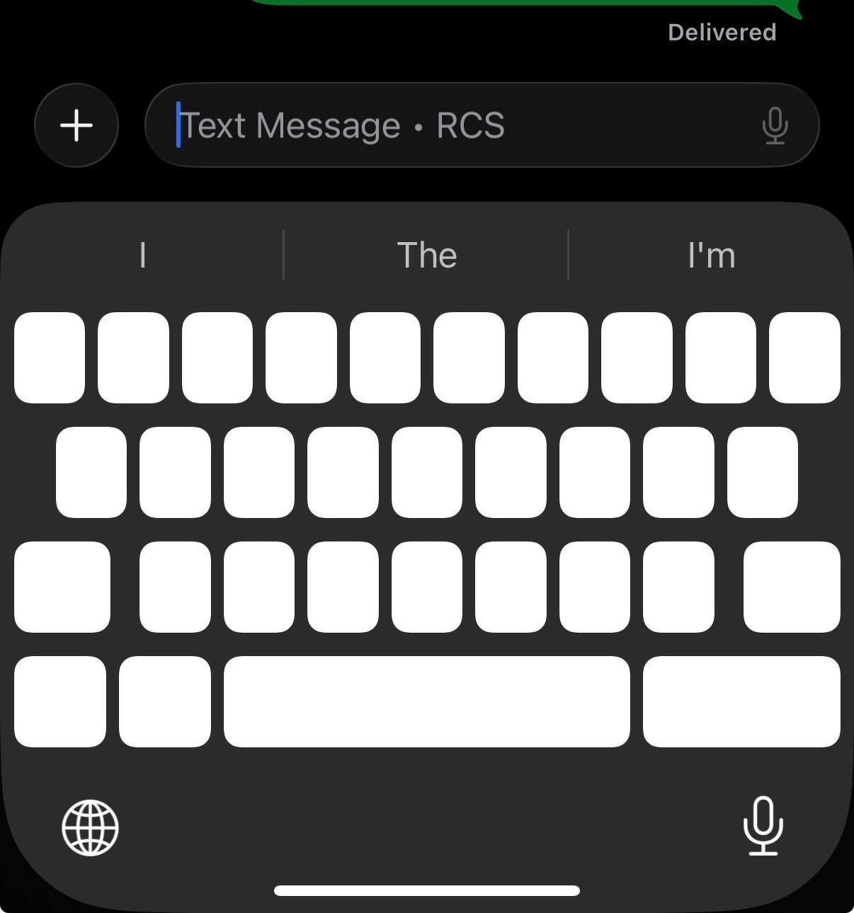 Screenshot of iPhone ios 26 keyboard. Letters are blank and just show white. A smartphone screen displays a keyboard with predictive text suggestions and a message field using the RCS protocol.